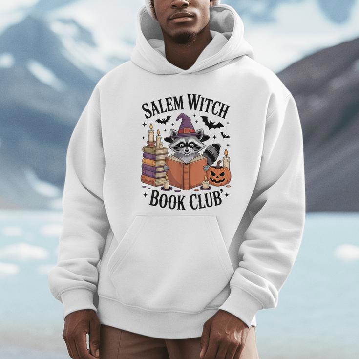 Salem WItch Book Club Halloween Raccoon Witch Reading Book Unisex Hoodie Salem WItch Book Club Halloween Raccoon Witch Reading Book Unisex Hoodie