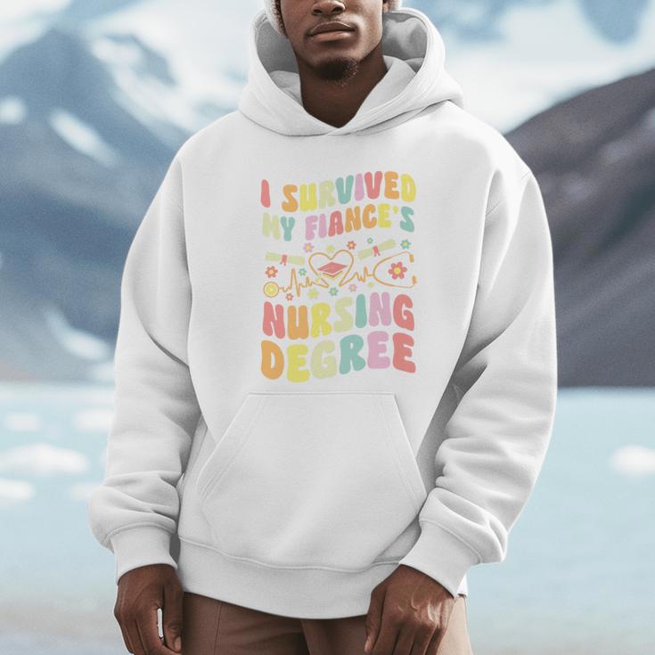 i Survived My Fiance's Nursing Degree Graduation Groovy Premium Unisex Hoodie