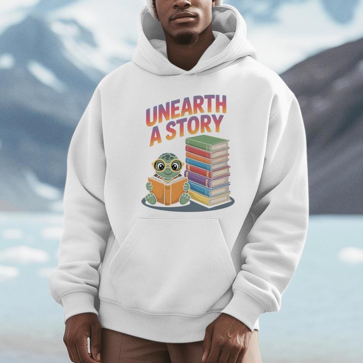 Unearth A Story Cute Turtle Reading Books Librarian Unisex Hoodie
