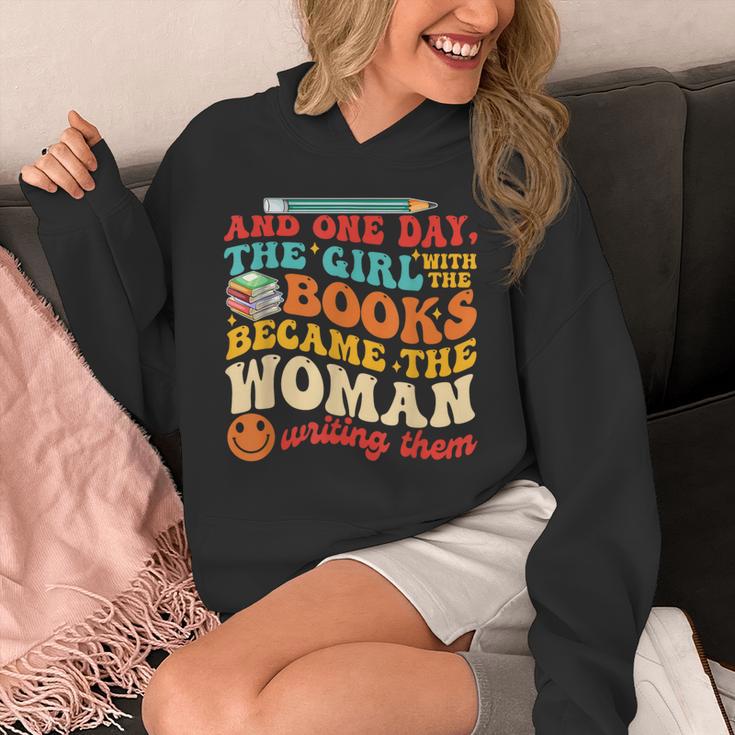 The Girl With The Books Became The Woman Writing Them Unisex Hoodie
