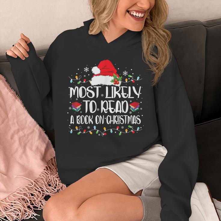 Most Likely To Read A Book On Christmas Family Matching Unisex Hoodie