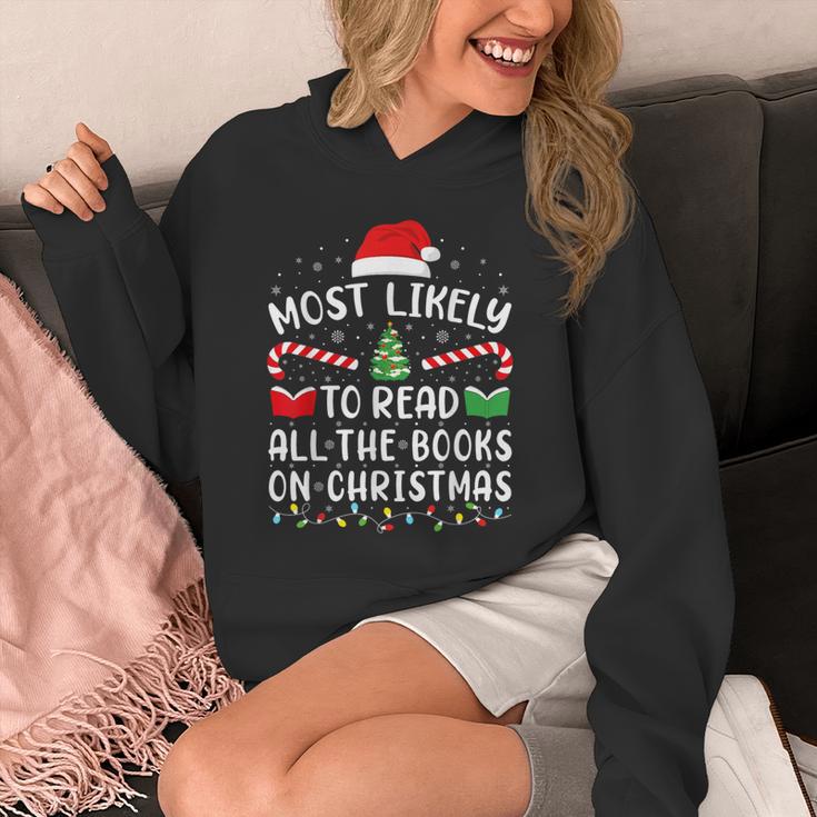 Most Likely To Read A Book On Christmas Family Matching Xmas Unisex Hoodie Most Likely To Read A Book On Christmas Family Matching Xmas Unisex Hoodie
