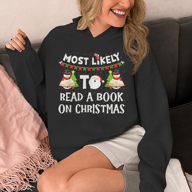 Most Likely To Read A Book On Christmas Snowman Family Unisex Hoodie