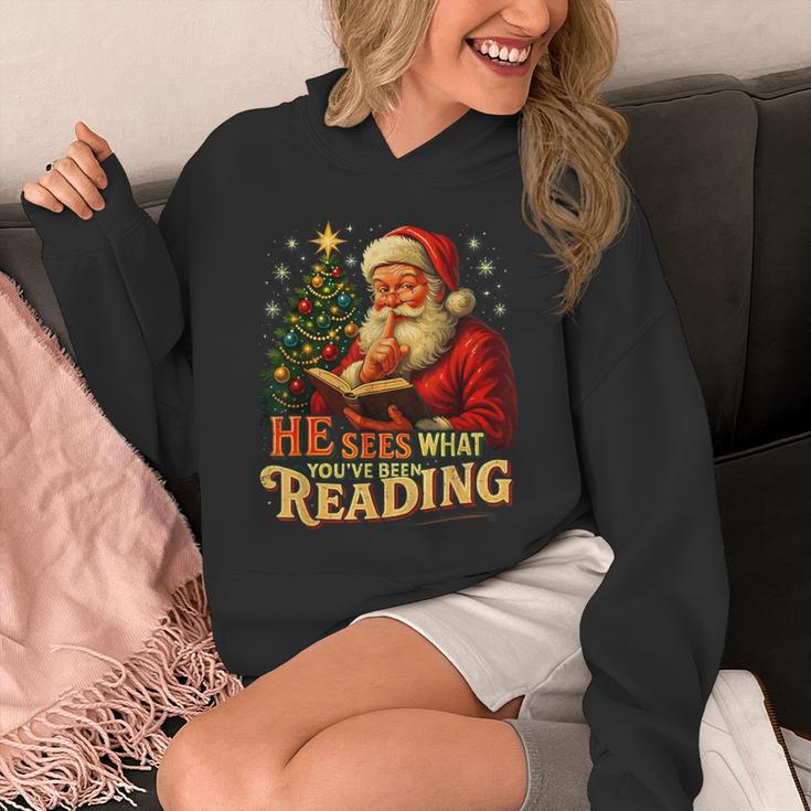 He Sees What You’Ve Been Reading Santa Book Lover Christmas Unisex Hoodie