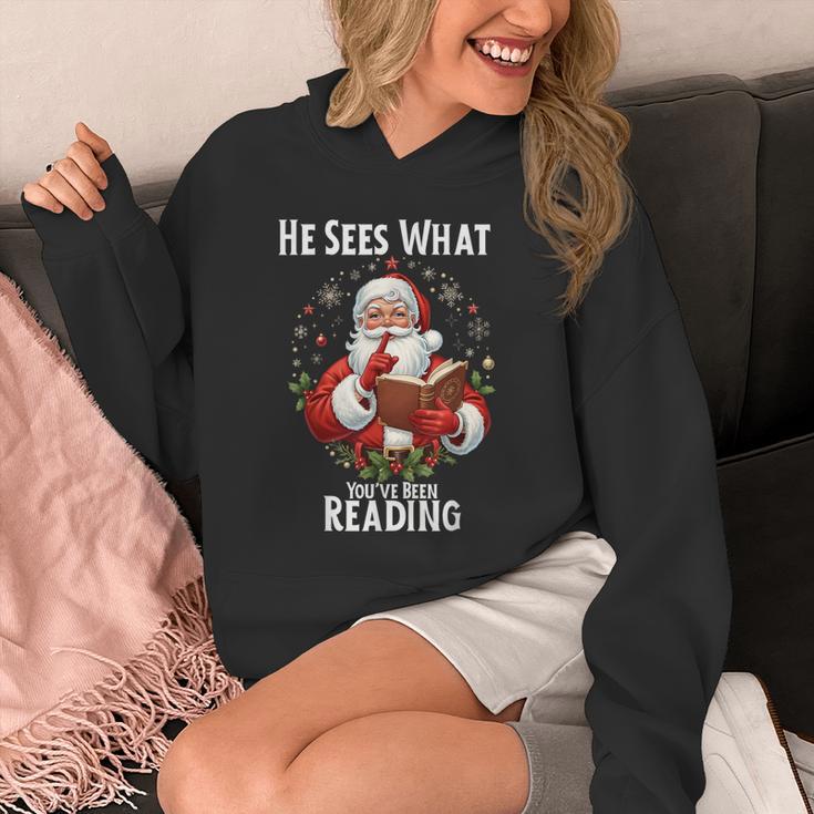 He Sees What You'Ve Been Reading Santa Book Lover For Women Unisex Hoodie