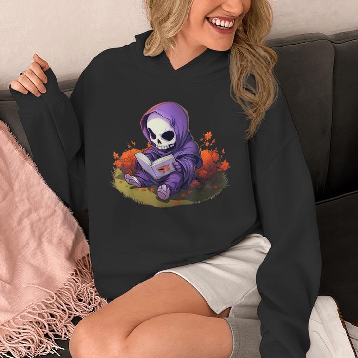 Spooky Grim Reaper Reading A Book Cute Creepy Halloween Unisex Hoodie Spooky Grim Reaper Reading A Book Cute Creepy Halloween Unisex Hoodie