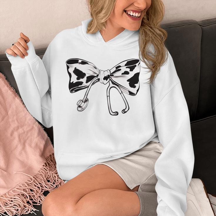 Cow Print Bow And Stethoscope Nurse RN Graduation Coquette Unisex Hoodie