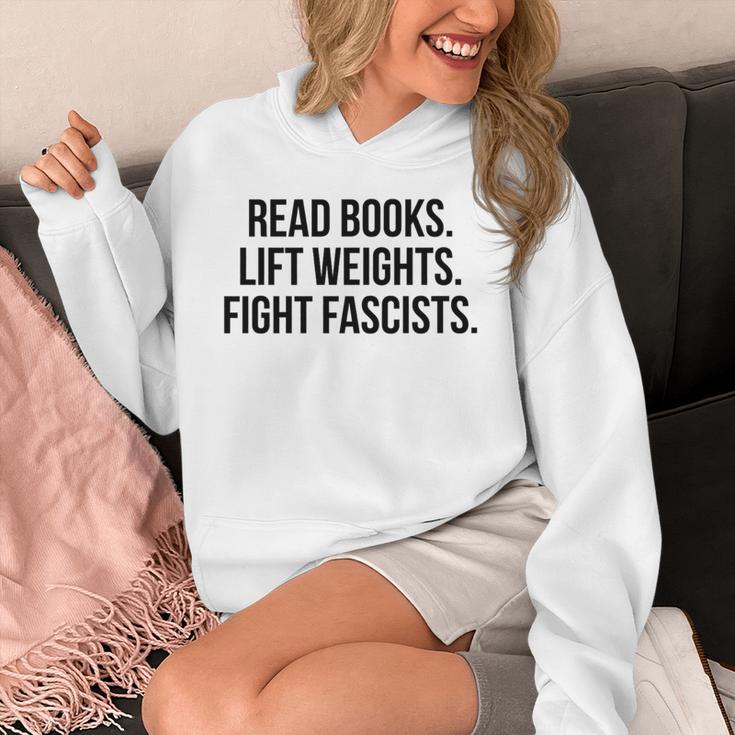 Read Books Lift Weights Fight Fascists Premium Tri-Blend Unisex Hoodie