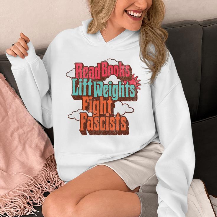 Read Books Lift Weights Fight Fascists Reading No Kings Premium Tri-Blend Unisex Hoodie