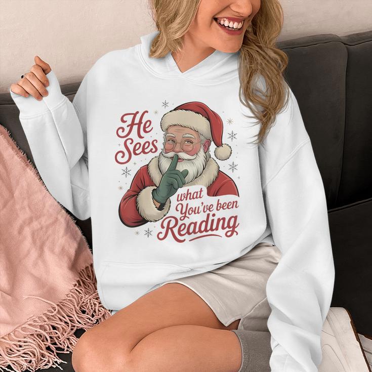 He Sees What You'Ve Been Reading Bookish Christmas Humor Unisex Hoodie He Sees What You'Ve Been Reading Bookish Christmas Humor Unisex Hoodie