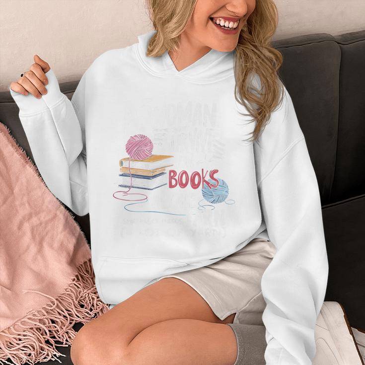 A Woman Cannot Survive On Books Alone She Also Needs Yarn Premium Unisex Hoodie