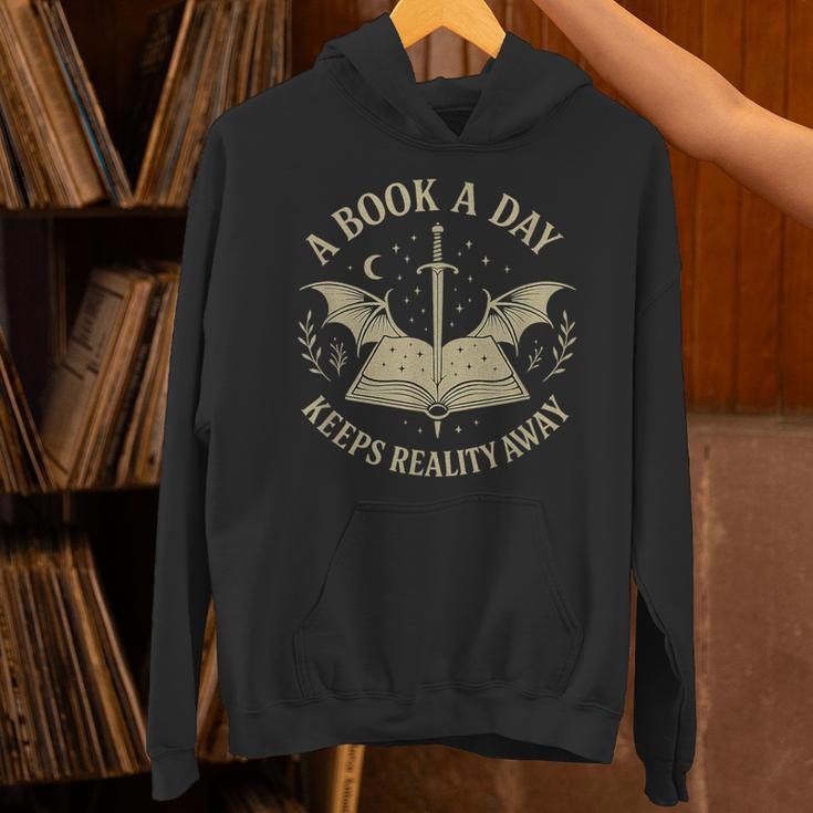 A Book A Day Keeps Reality Away Reading Escape Quote Unisex Hoodie
