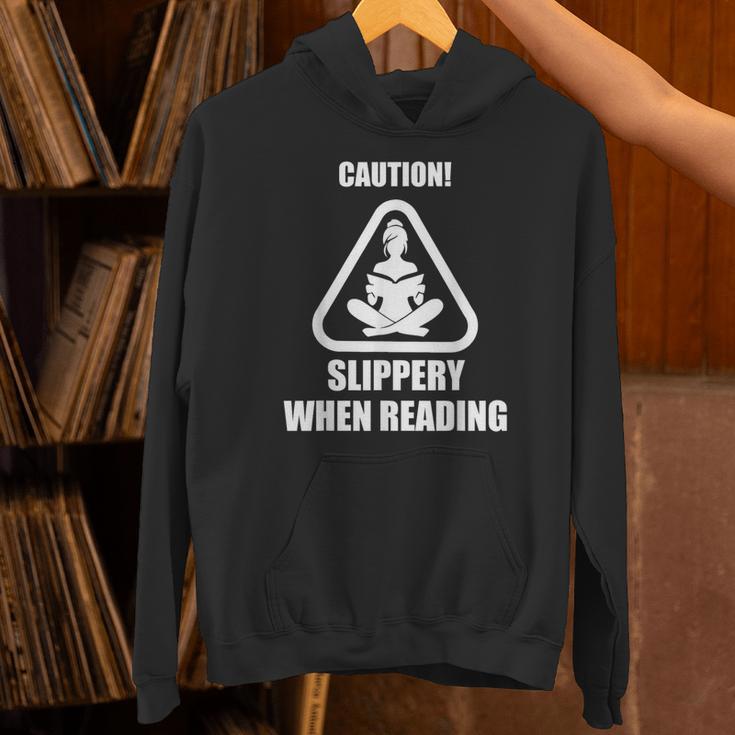 Caution Slippery When Reading Book Lover Unisex Hoodie Caution Slippery When Reading Book Lover Unisex Hoodie