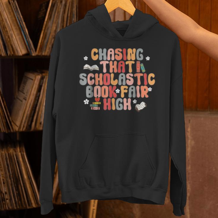 CHASING THAT SCHOLASTIC BOOK FAIR HIGH Unisex Hoodie