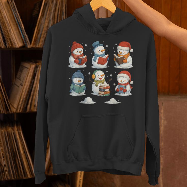 Cute Snowman Reading Books Christmas Winter Book Lover Unisex Hoodie Cute Snowman Reading Books Christmas Winter Book Lover Unisex Hoodie