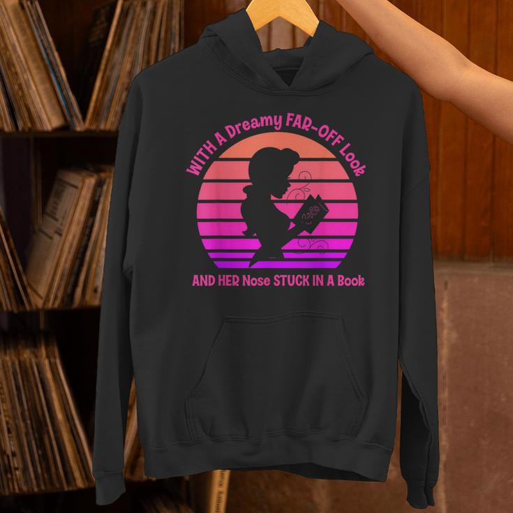 With A Dreamy Far-Off Look And Her Nose Stuck In A Book Unisex Hoodie