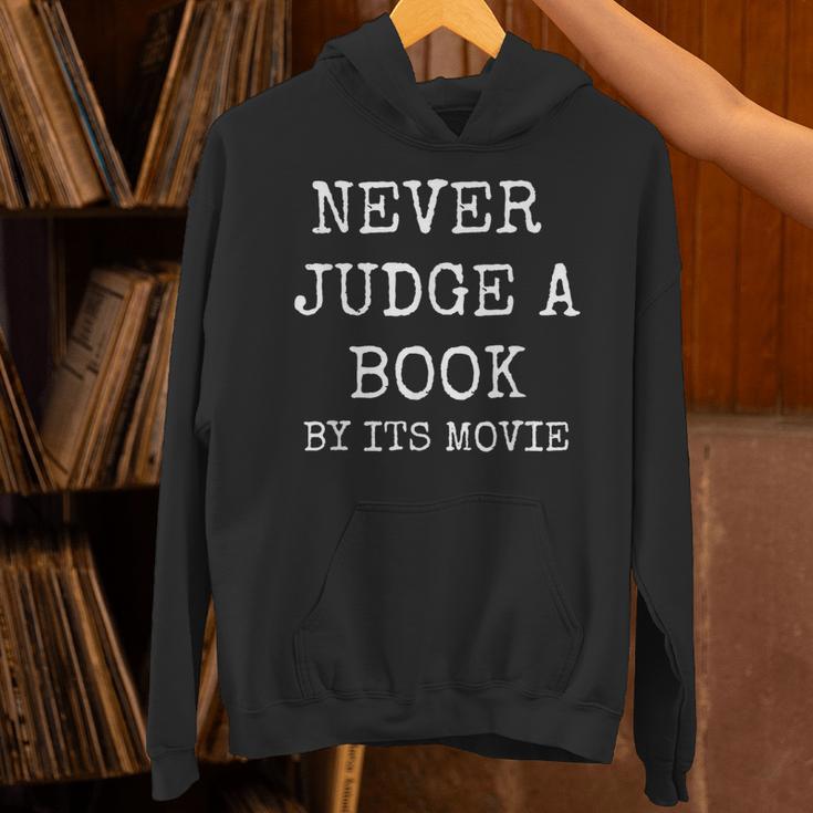 Never Judge a Book By Its Movie Unisex Hoodie Never Judge a Book By Its Movie Unisex Hoodie
