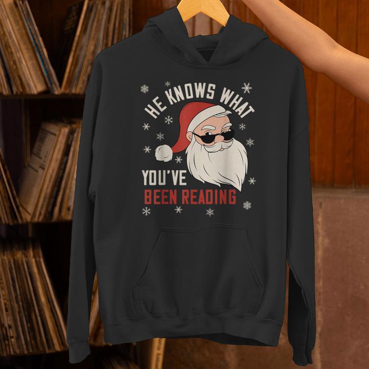 He Knows What You'Ve Been Reading Book Lover Women Santa Unisex Hoodie He Knows What You'Ve Been Reading Book Lover Women Santa Unisex Hoodie