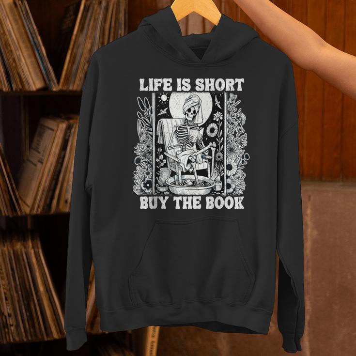 Life Is Short Buy The Book Introvert Skeleton Reading Unisex Hoodie