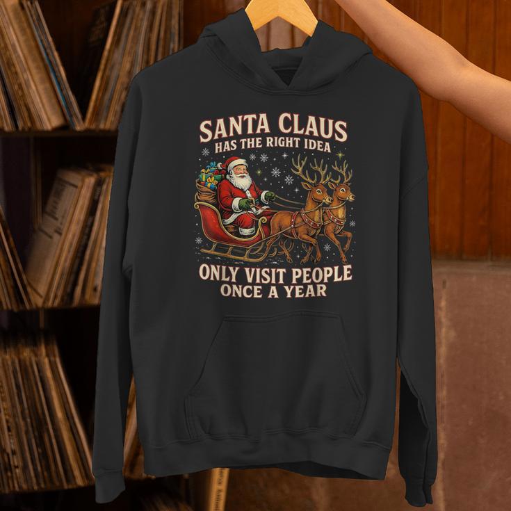 Santa Has The Right Idea Introvert Christmas Unisex Hoodie Santa Has The Right Idea Introvert Christmas Unisex Hoodie
