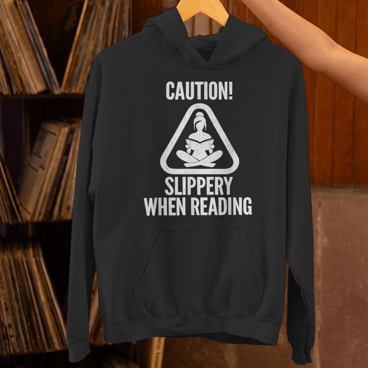 Slippery When Reading Unhinged Book Lover Meme Witty Unisex Hoodie Slippery When Reading Unhinged Book Lover Meme Witty Unisex Hoodie
