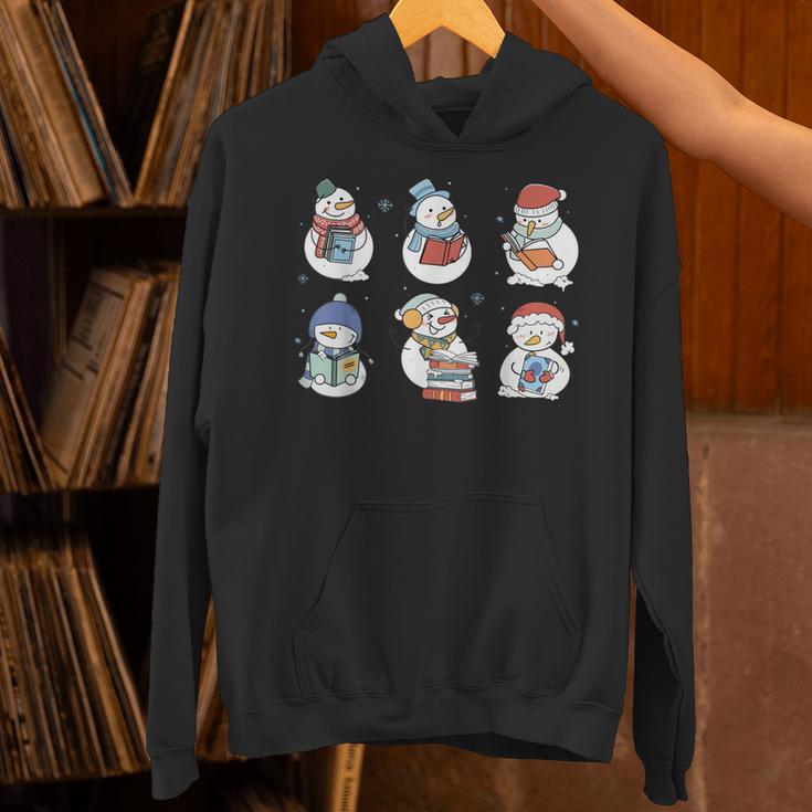 Snowman Reading Book Santa Christmas Bookish Teacher Unisex Hoodie Snowman Reading Book Santa Christmas Bookish Teacher Unisex Hoodie