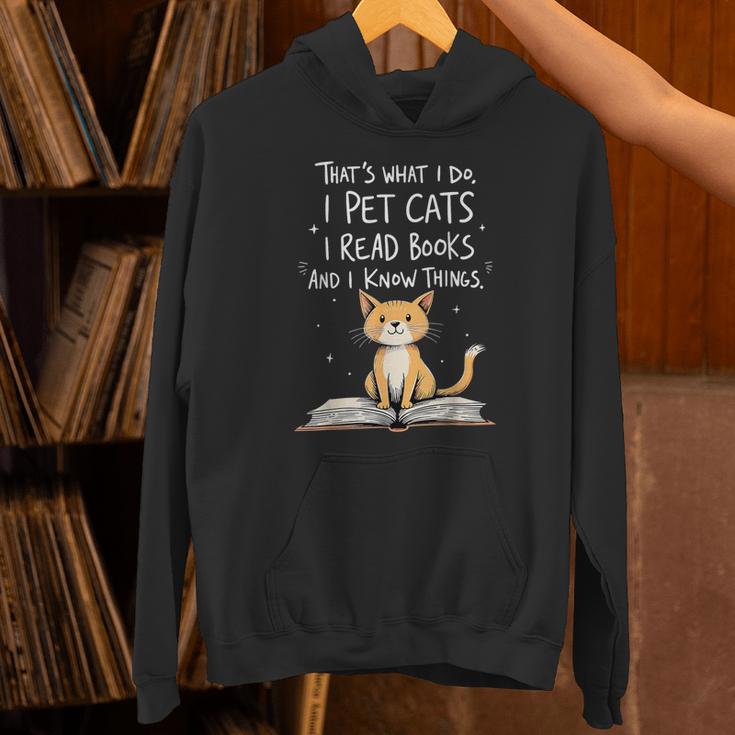 That's What I Do I Pet Cats I Read Books And I Know Things Unisex Hoodie