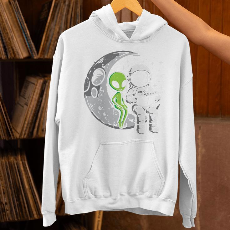 Astronaut Reading Book To Alien Moon Space Women Kids Men Premium Tri-Blend Unisex Hoodie