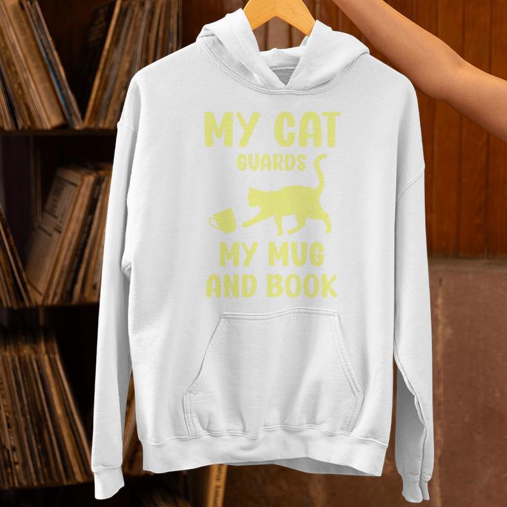 My Cat Guards My Mug And Book Humor Cats Premium Tri-Blend Unisex Hoodie My Cat Guards My Mug And Book Humor Cats Premium Tri-Blend Unisex Hoodie