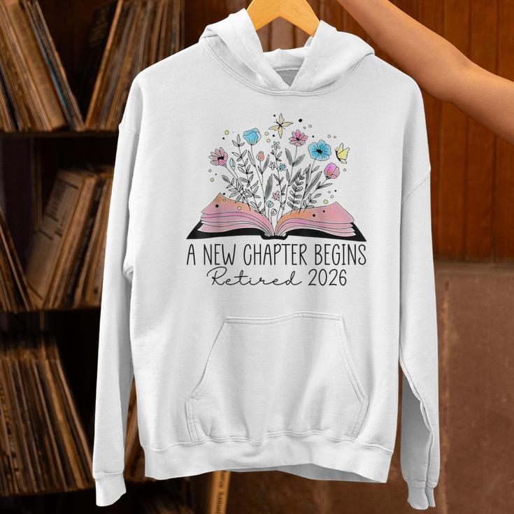 Floral Book A New Chapter Begins Retired 2026 Retirement Unisex Hoodie Floral Book A New Chapter Begins Retired 2026 Retirement Unisex Hoodie