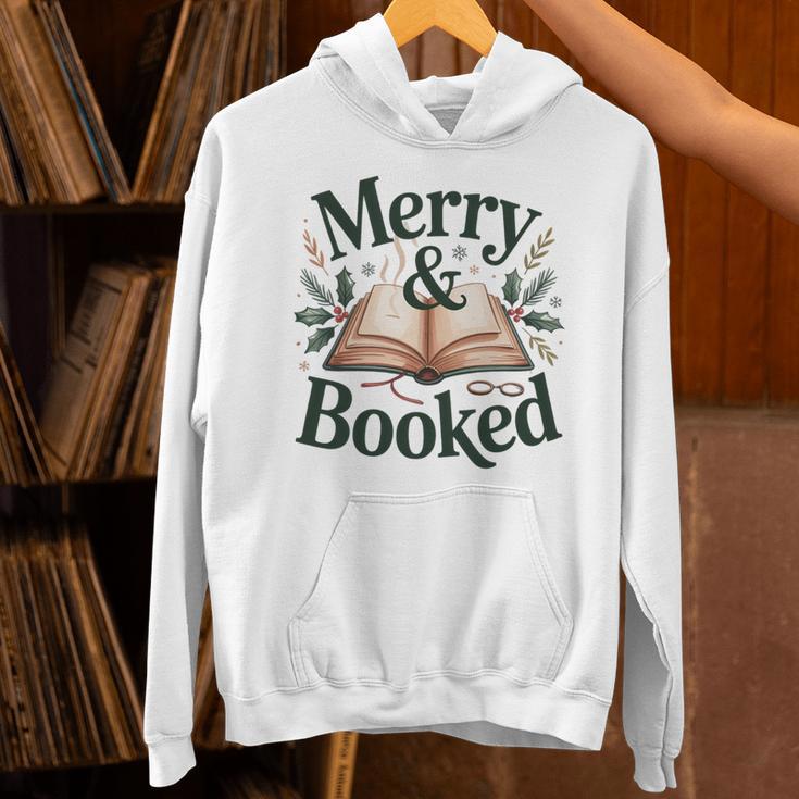 Merry And Booked Holiday Reading Winter Book Lover Premium Tri-Blend Unisex Hoodie