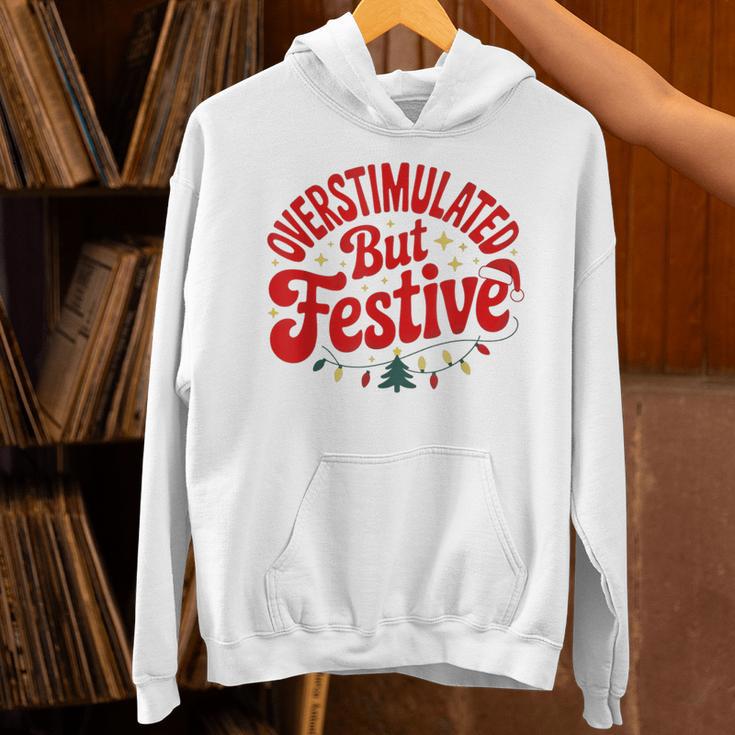 Overstimulated But Festive – Christmas Introvert Humor Unisex Hoodie