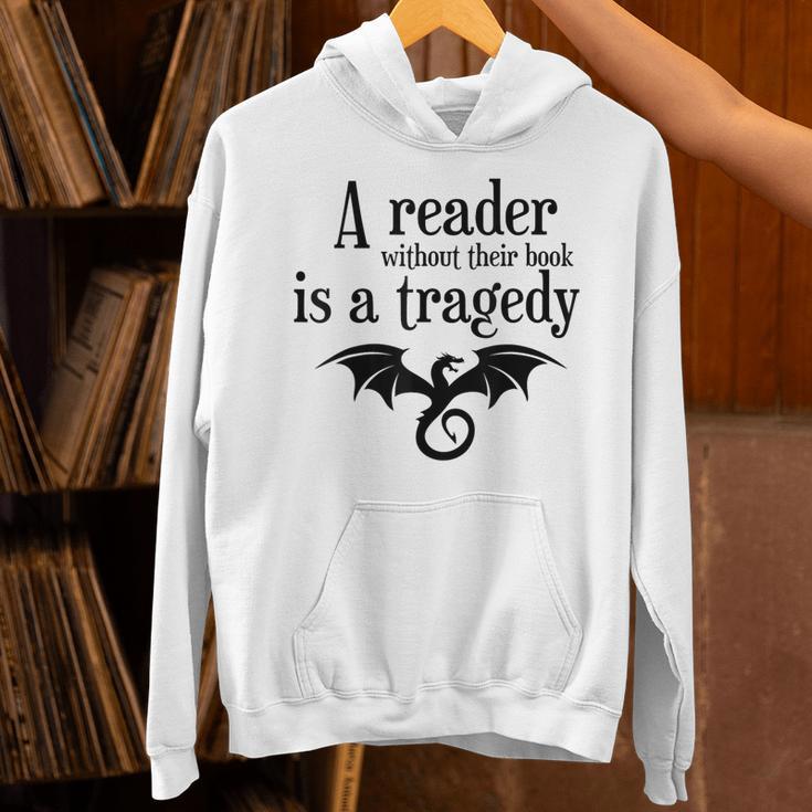 A Reader Without Their Book Is A Tragedy Dragon Rider Unisex Hoodie