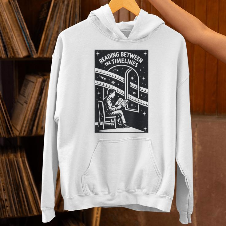 Reading Between The Timelines Time Travel Books Unisex Hoodie Reading Between The Timelines Time Travel Books Unisex Hoodie