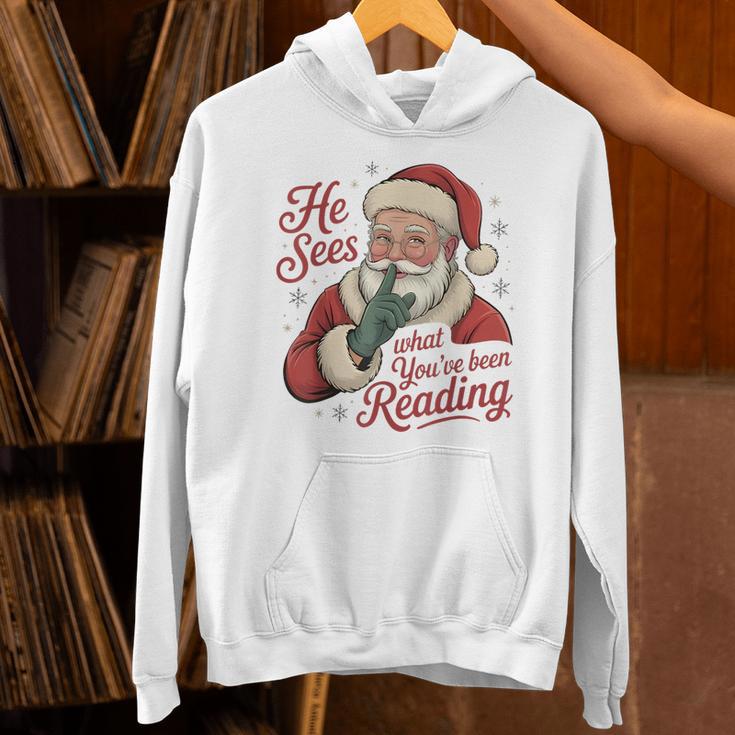 He Sees What You'Ve Been Reading Bookish Christmas Humor Unisex Hoodie He Sees What You'Ve Been Reading Bookish Christmas Humor Unisex Hoodie