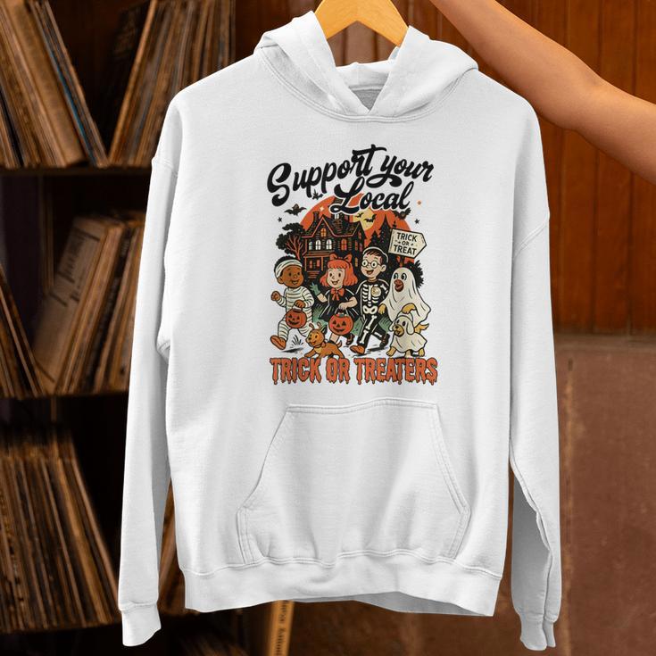 Support Your Local Trick Or Treaters Retro Spooky Nostalgia Unisex Hoodie Support Your Local Trick Or Treaters Retro Spooky Nostalgia Unisex Hoodie