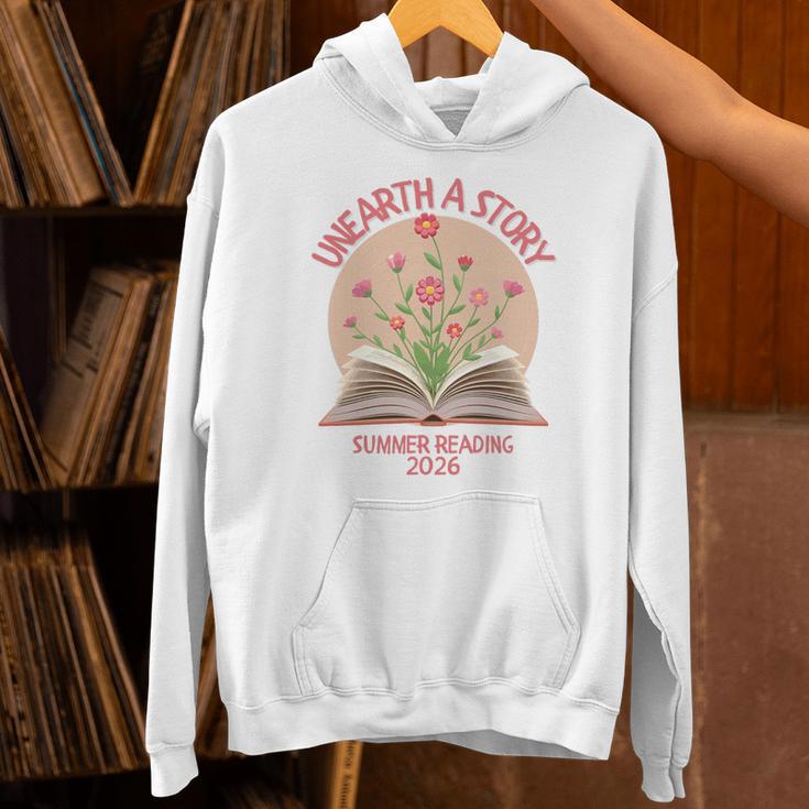 Unearth a Story 2026 Summer Reading Program Flowers Book Premium Tri-Blend Unisex Hoodie
