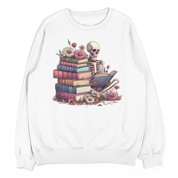 Reading A Book Per Day Keeps Reality Away Skeleton Books Unisex Sweatshirt