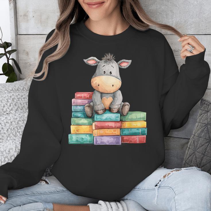 Adorable Donkey With Heart Sitting On Colorful Book Stack Unisex Sweatshirt