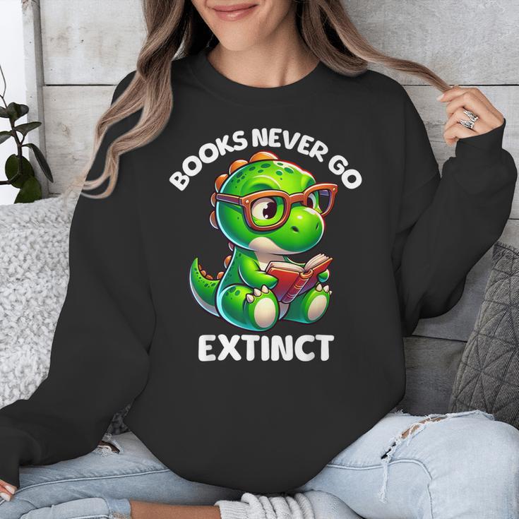 Books Never Go Extinct Reading Dinosaur Bookish Nerdy Unisex Sweatshirt Books Never Go Extinct Reading Dinosaur Bookish Nerdy Unisex Sweatshirt