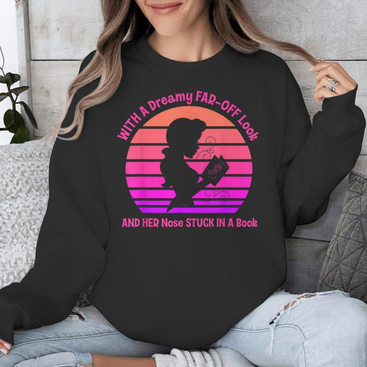 With A Dreamy Far-Off Look And Her Nose Stuck In A Book Unisex Sweatshirt
