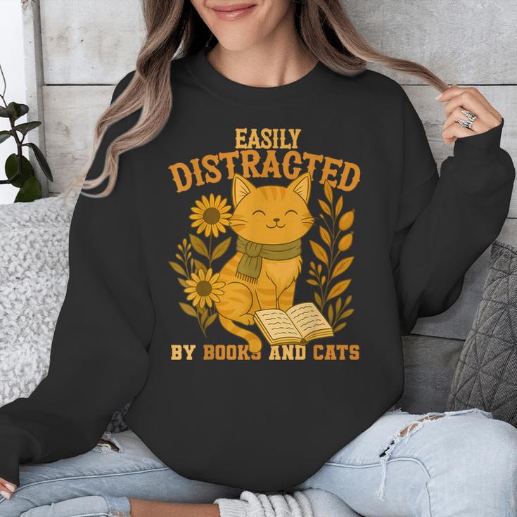 Easily Distracted By Cats And Books Cute Cat Book Lover Unisex Sweatshirt