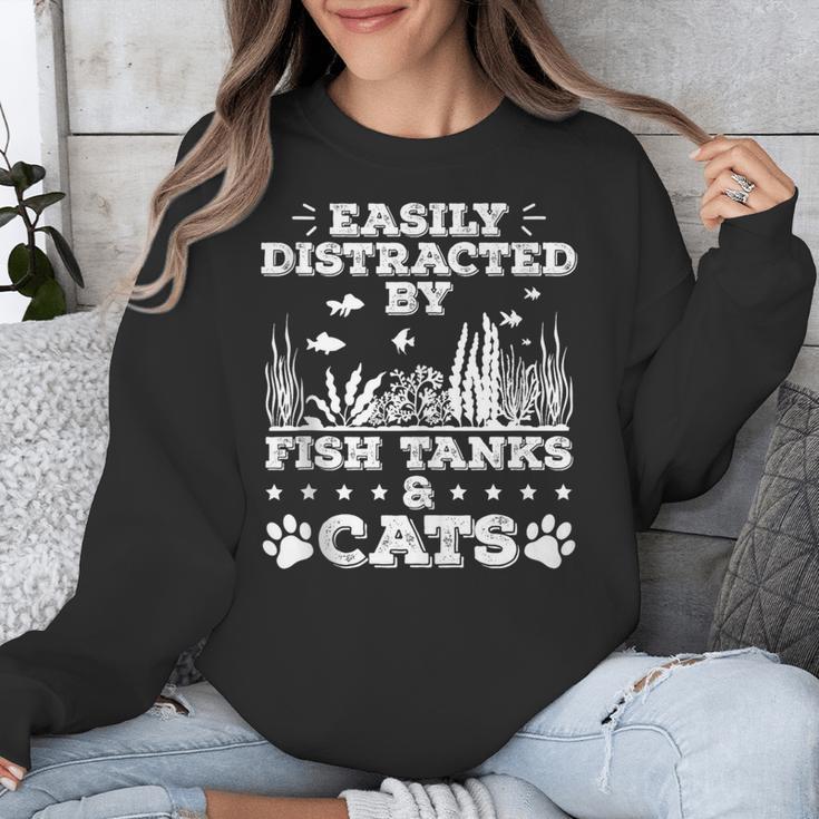 Easily Distracted By Fish Tanks And Cats Lover Introvert Unisex Sweatshirt