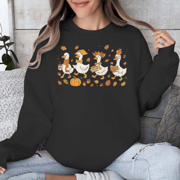 Fall Goose Reading Book Teacher Autumn Pumpkin Cozy Season Unisex Sweatshirt