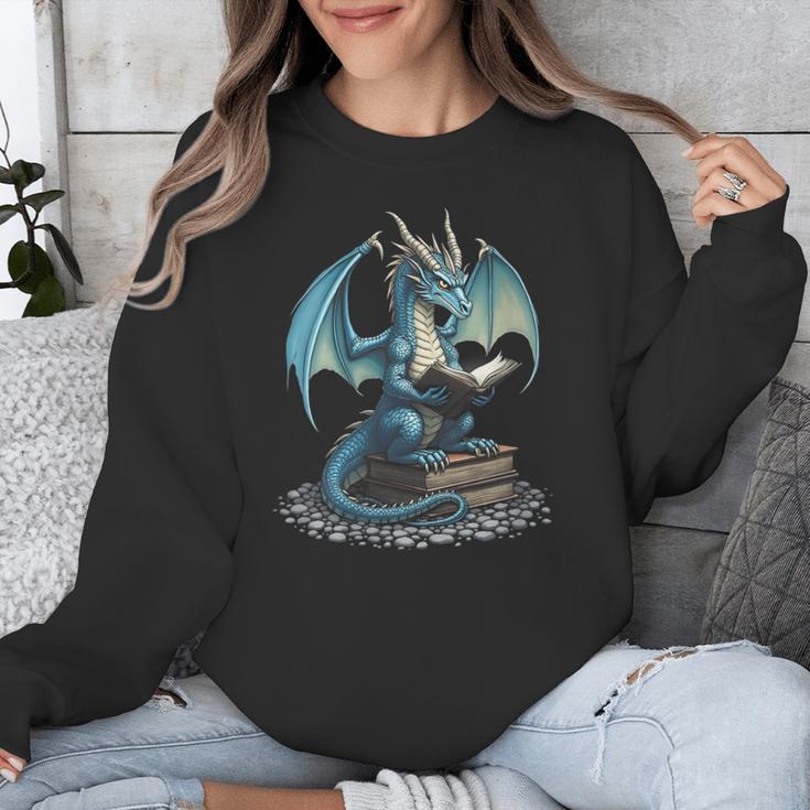 Fantasy Dragon Reading Magical Book Lover Halloween Vibes Unisex Sweatshirt Fantasy Dragon Reading Magical Book Lover Halloween Vibes Unisex Sweatshirt