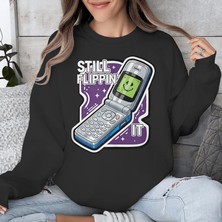 Still Flippin' It Retro Flip Phone 90s Y2K Nostalgia Unisex Sweatshirt Still Flippin' It Retro Flip Phone 90s Y2K Nostalgia Unisex Sweatshirt