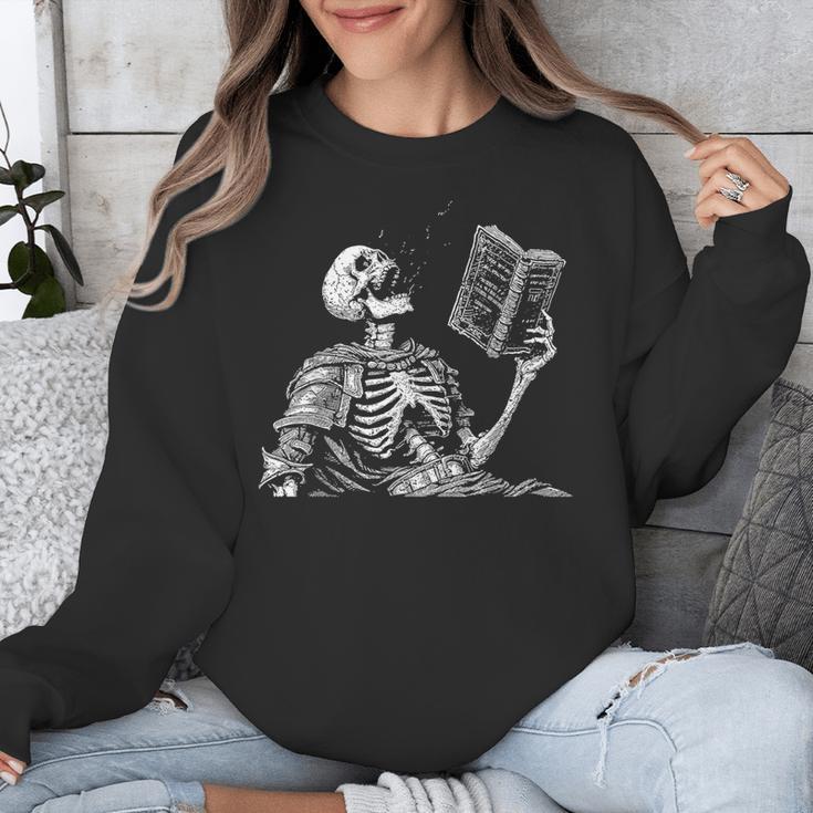 Hilarious Skeleton Holding a Book And Laughing Gothic Unisex Sweatshirt