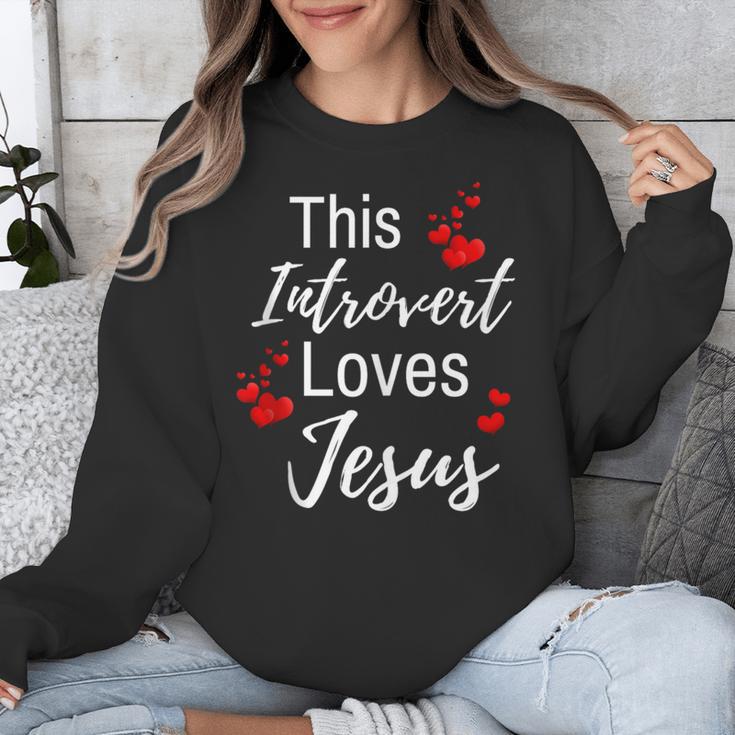This Introvert Loves Jesus Religious Red Hearts Graphic Unisex Sweatshirt This Introvert Loves Jesus Religious Red Hearts Graphic Unisex Sweatshirt