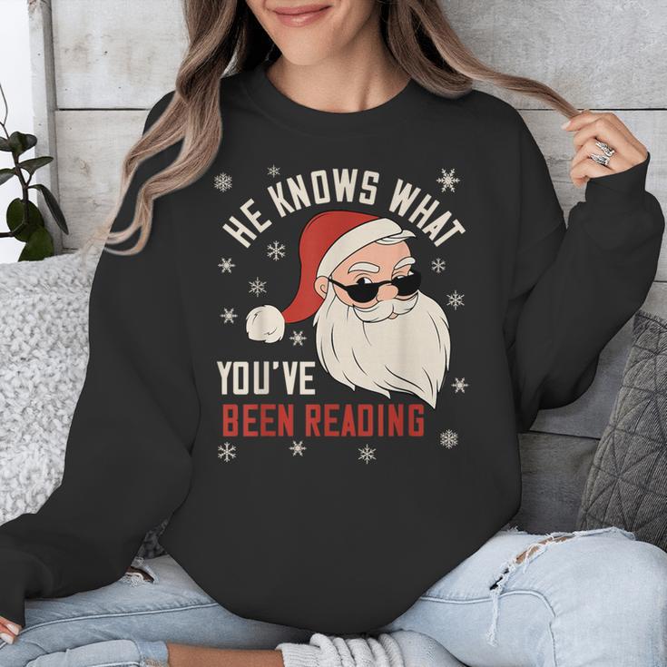 He Knows What You'Ve Been Reading Book Lover Women Santa Unisex Sweatshirt He Knows What You'Ve Been Reading Book Lover Women Santa Unisex Sweatshirt
