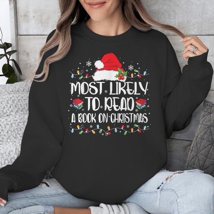 Most Likely To Read A Book On Christmas Family Matching Unisex Sweatshirt Most Likely To Read A Book On Christmas Family Matching Unisex Sweatshirt